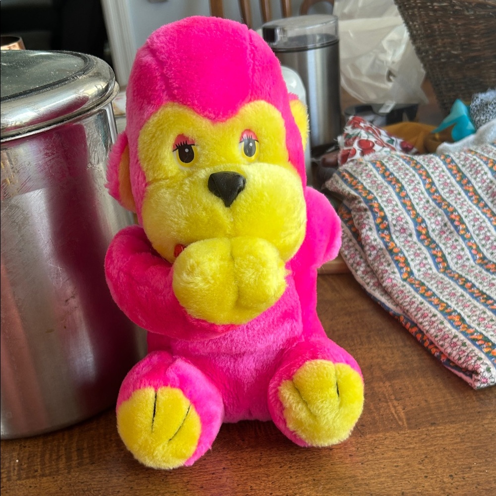 pink and yellow plush monkey or gorilla stuffed animal. Vintage